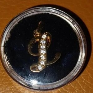 Gold plated letter pendant "L" with faux diamonds